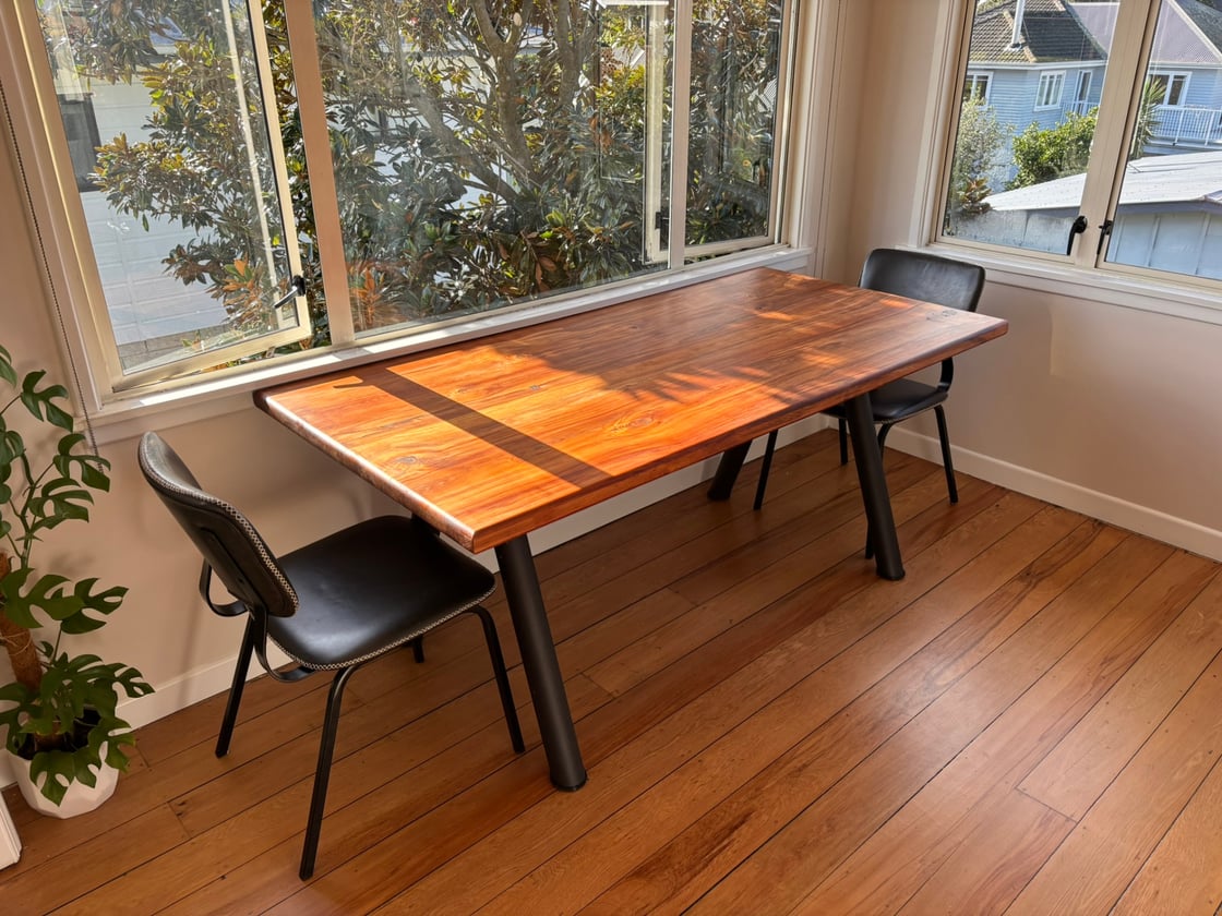Custom solid timber slab dining table made in New Zealand by Design Eye