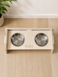Personalised raised dog bowl holder engraved with the name Ruby