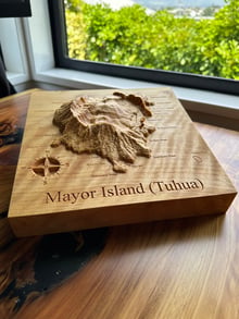 Solid timber terrain model of Mayor Island (Tuhua) with engraved place names